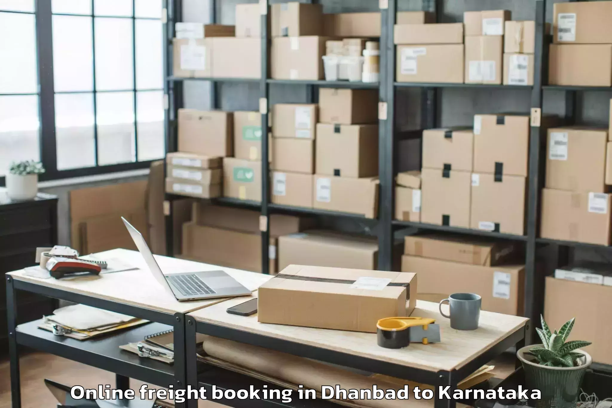 Reliable Dhanbad to Garuda Swagath Mall Online Freight Booking